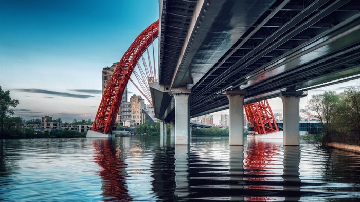 Moscow Bridge Over Calm River at Dusk