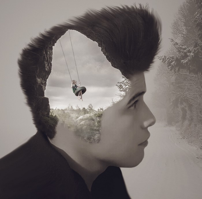 Double exposure of a man's head with a girl on a swing inside