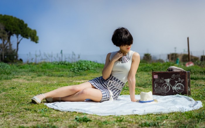 Woman Relaxing Outdoors on a Sunny Day