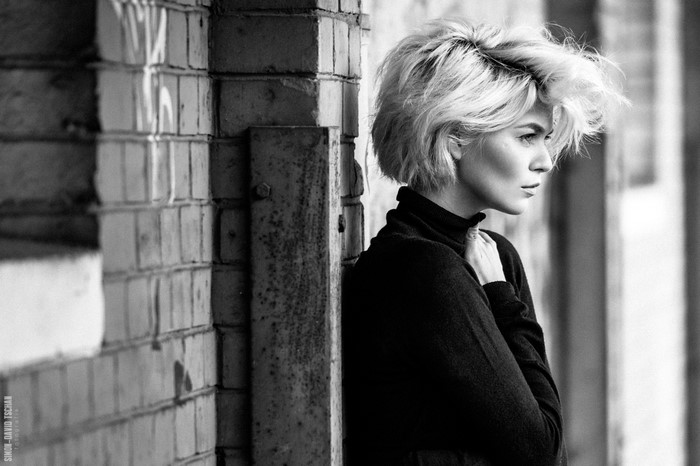 Monochrome portrait of a woman with short blonde hair