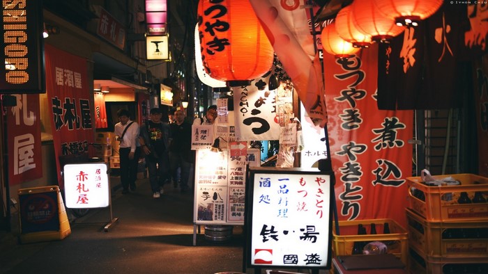 Japanese Izakaya street at night with lanterns