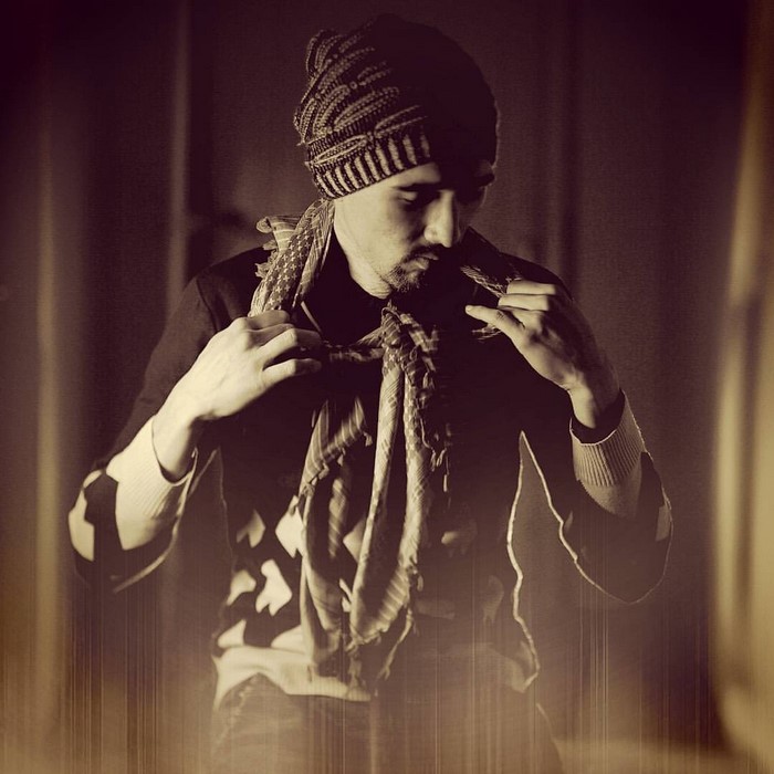 Man wearing a beanie and scarf