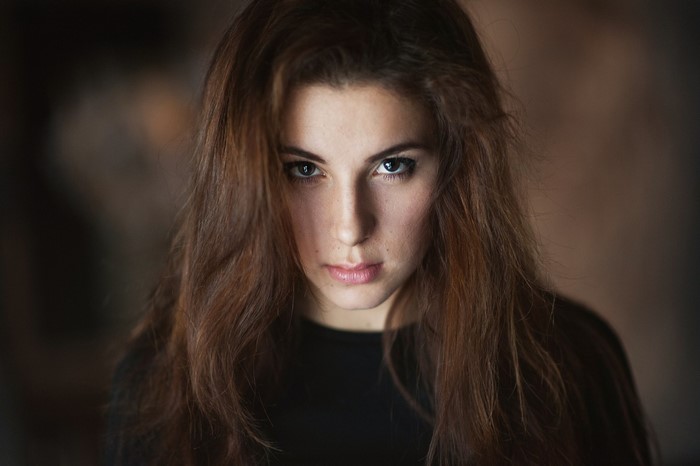 Portrait of a woman with long brown hair