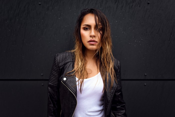 Woman in leather jacket in the rain