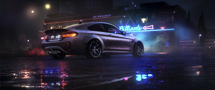 BMW M4 sports car on wet street at night