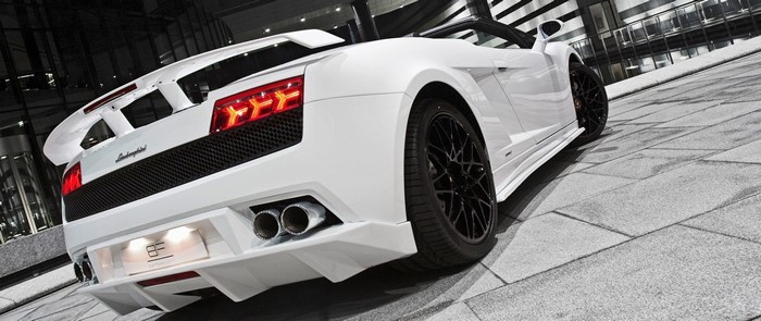 White Lamborghini Gallardo convertible with black wheels