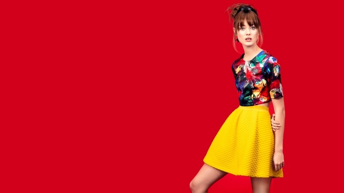 Model Monika Jagaciak in colorful top and yellow skirt