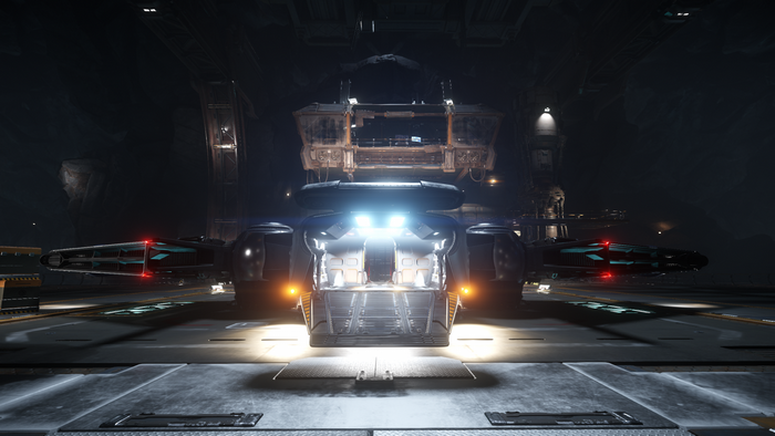 Star Citizen spaceship in a hangar at night