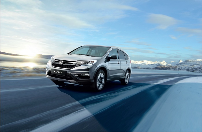 Honda CR-V driving on a snowy road