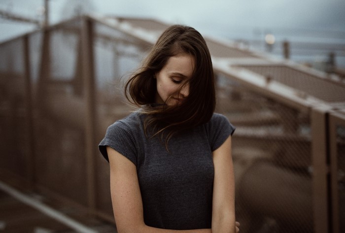 Woman with hair blowing in the wind