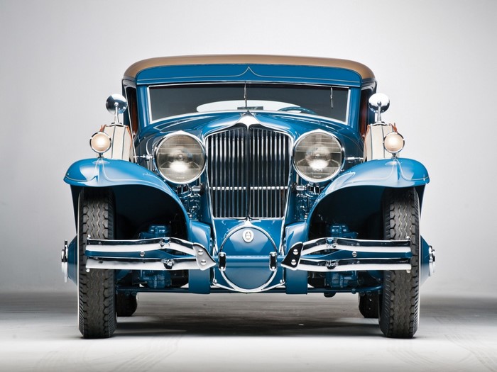 Front view of a blue Cord L-29 vintage touring car