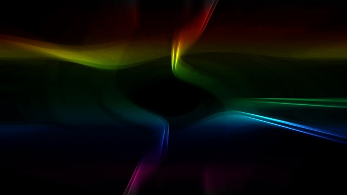 Abstract colorful light waves on black background