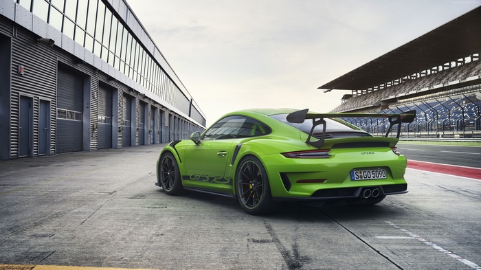 Green Porsche 911 GT3 RS on a Race Track