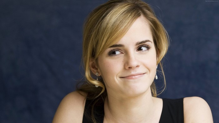 Emma Watson Smiling with Blue Background