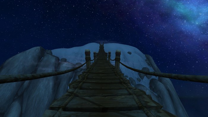 Wooden bridge under a starry night sky
