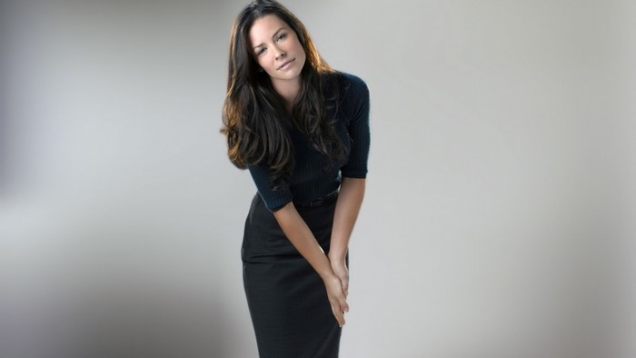 Elegant Brunette Woman in Black Dress