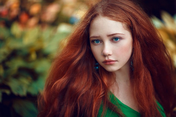 Portrait of a Redhead Woman with Blue Eyes