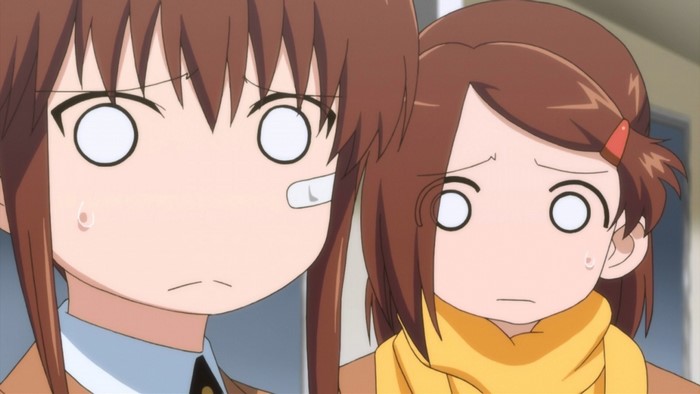 Two anime girls from Kiss x Sis with surprised expressions