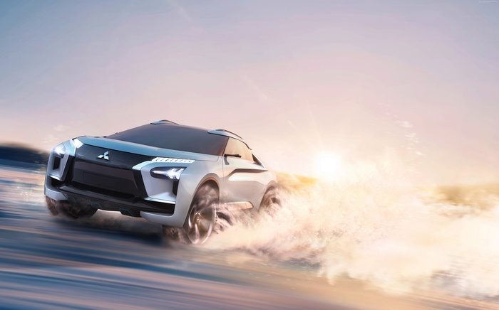 Mitsubishi e-Evolution Concept car driving on sand