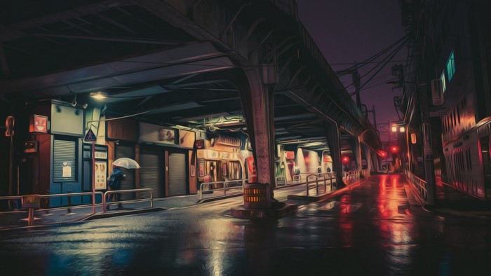 Rainy night under an elevated train track in a city