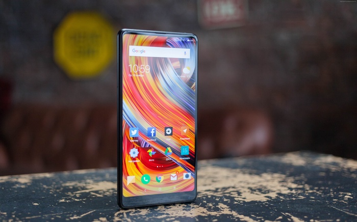 Xiaomi Mi MIX 2S smartphone with colorful wallpaper