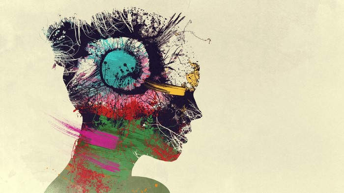 Abstract profile of a woman with colorful paint splashes