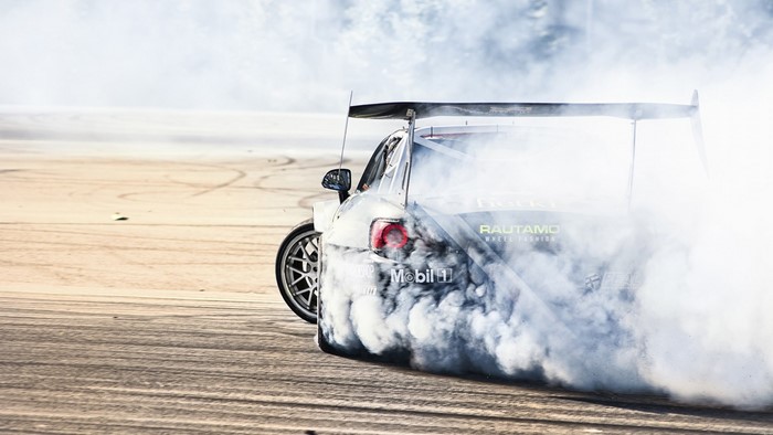 Drifting race car with Mobil 1 sponsorship