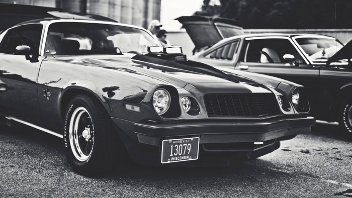 Monochrome Chevrolet Camaro Z28 with custom hood scoop