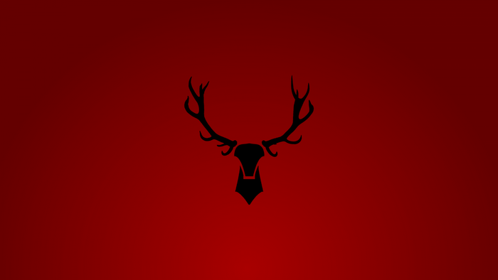 Black deer antlers on red background