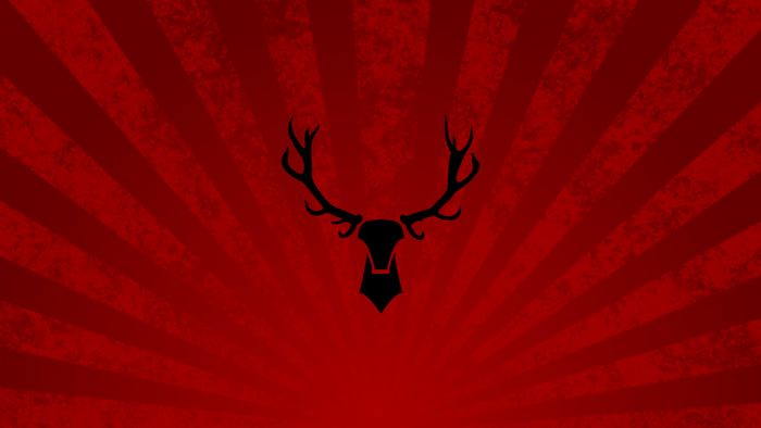 Black deer silhouette on red sunburst background