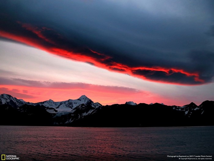 Sunset over mountains and sea