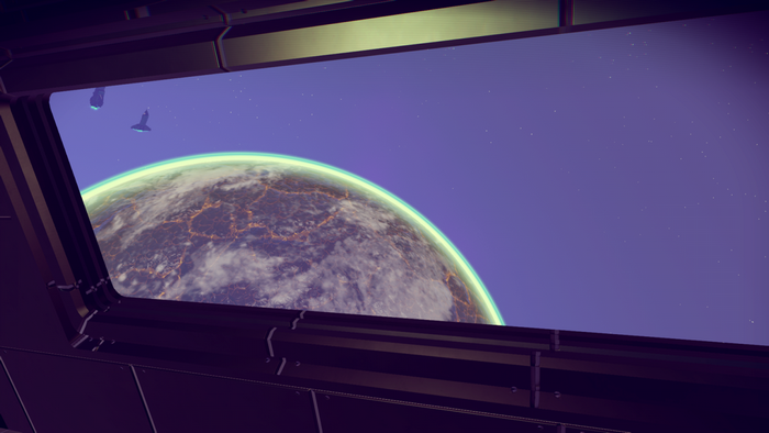 View from a spaceship window of a planet in No Man's Sky