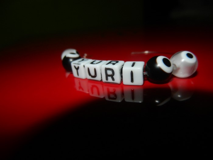 Bracelet with letters YURI and eye beads
