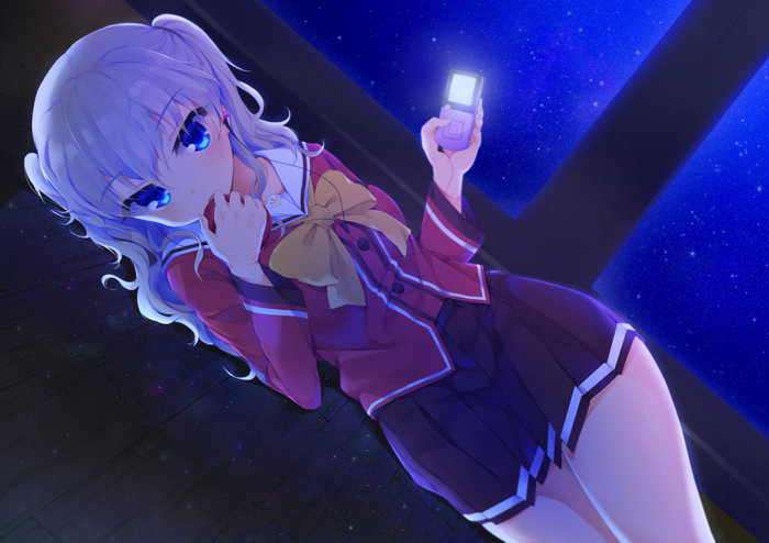 Tomori Nao from Charlotte holding a phone