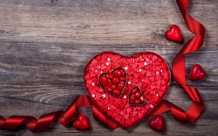 Heart-shaped box of chocolates and red ribbon, 4K