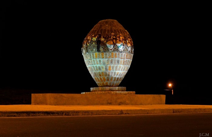 Egg-shaped monument at night in Uruguay