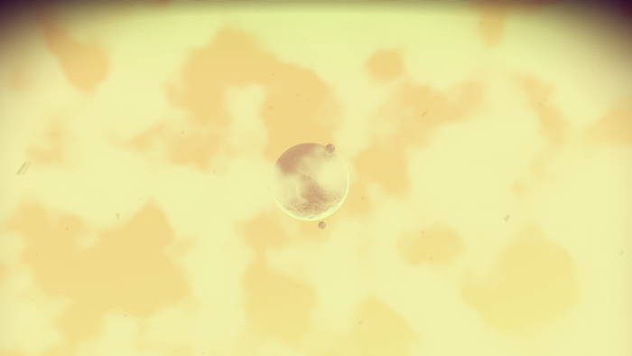 No Man's Sky planet with moons in yellow atmosphere