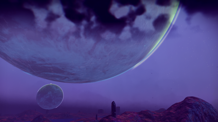 No Man's Sky screenshot of alien planets at night