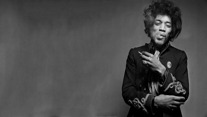 Jimi Hendrix smoking a cigarette