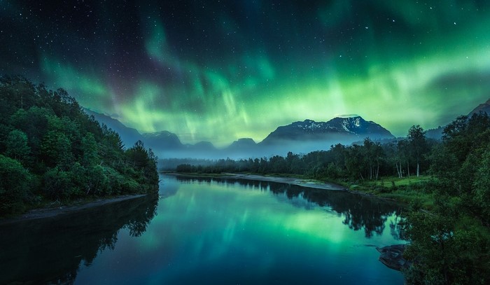Aurora Borealis over a River and Mountains