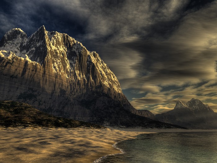 Mountain landscape with beach and sea under dramatic sky