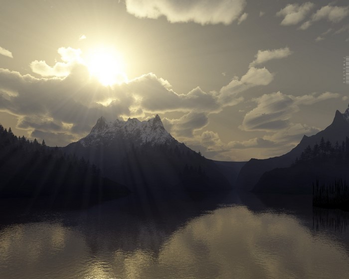 Sunlight over a mountain lake with reflections