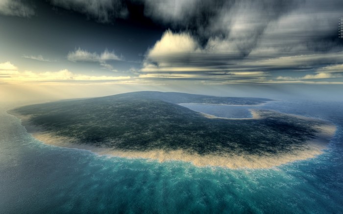 Island coast with ocean waves and clouds at sunrise