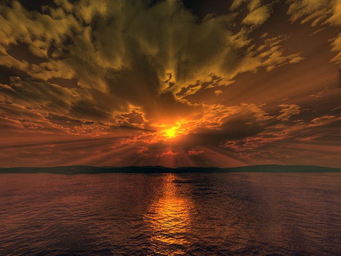 Sunset Over Calm Ocean with Dramatic Clouds