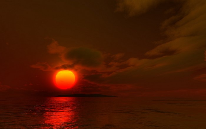 Sunset over the ocean with island