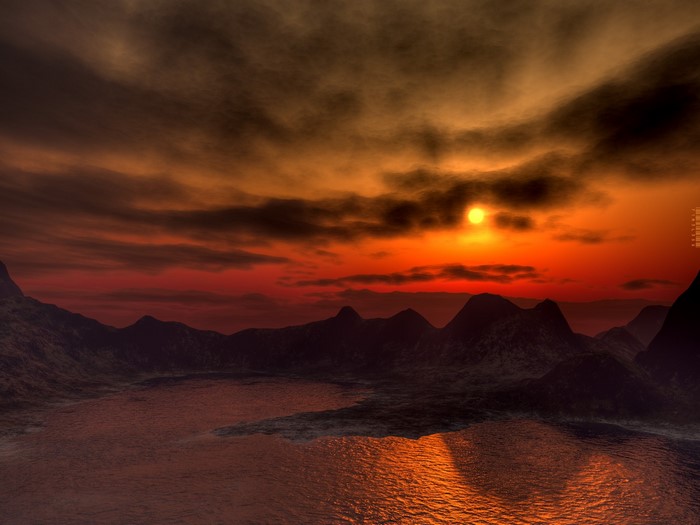 Sunset over a rocky mountain lake with dramatic clouds