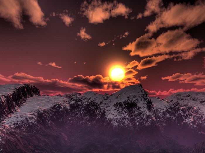 Sunset over snow-capped mountains