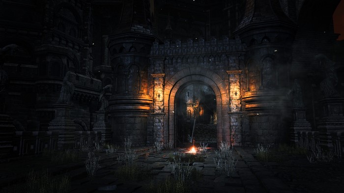 Dark Souls III screenshot of a castle gate at night