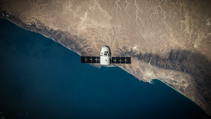 SpaceX Dragon spacecraft orbiting Earth