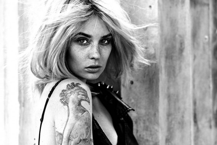 Monochrome portrait of Scarlett Simoneit with tattoo